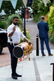 A dhol drummer waits...