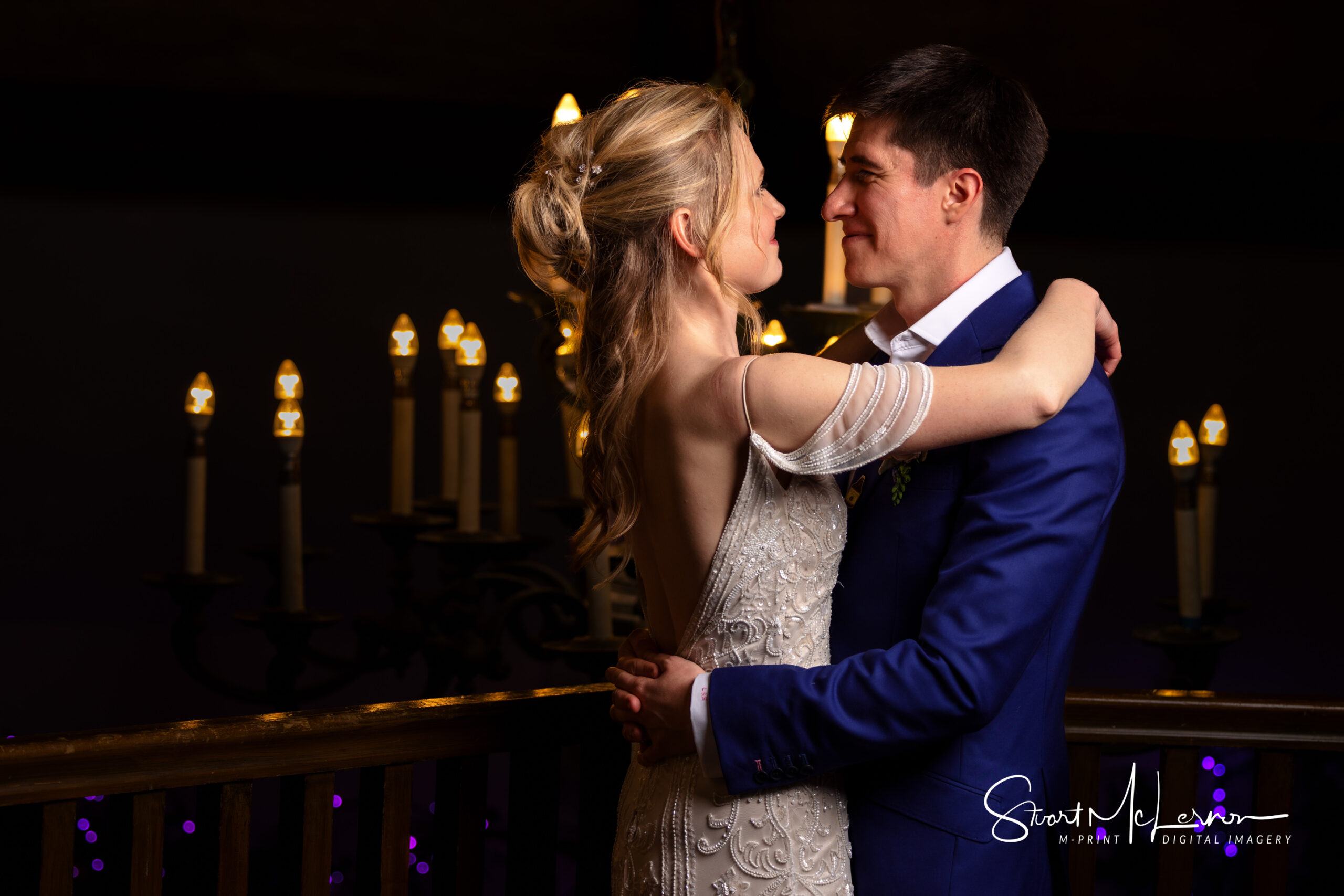 The bride and groom pose for a portrait at Shrigley Hall